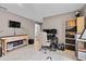 Home office with an assortment of instruments, a workspace, and a light wood accent shelf at 647 Hart Lake Dr, Winter Haven, FL 33884