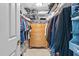 Bright walk-in closet with custom shelving and plentiful storage spaces at 647 Hart Lake Dr, Winter Haven, FL 33884
