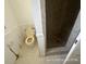 Outdated bathroom featuring a toilet and a walk-in shower at 6610 Chippendale Rd, Lakeland, FL 33809