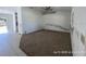 Spacious living room featuring a ceiling fan and carpeted floors at 6610 Chippendale Rd, Lakeland, FL 33809