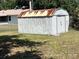 Metal storage shed located in the backyard, providing extra storage space for tools and equipment at 6610 Chippendale Rd, Lakeland, FL 33809