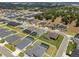 Beautiful aerial view highlights the property, neighboring homes, and community amenities with lush landscaping at 6777 Bentridge Dr, Lakeland, FL 33813