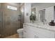Bathroom with glass shower and vanity at 6777 Bentridge Dr, Lakeland, FL 33813