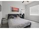 Comfortable bedroom with decorative art, window, and desk at 6777 Bentridge Dr, Lakeland, FL 33813