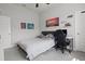 Neutral bedroom with desk and art at 6777 Bentridge Dr, Lakeland, FL 33813