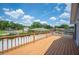 Wide angle view of the wooden deck overlooking the neighborhood, offering a view of the surrounding area at 707 Laurel Pointe Ct, Lakeland, FL 33813
