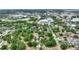 An aerial view of a neighborhood location with mature trees and lush landscaping at 716 S Franklin Pl, Lakeland, FL 33815