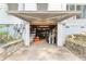 Spacious garage with storage shelves, offering ample space for parking and projects at 716 S Franklin Pl, Lakeland, FL 33815