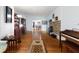 Open-concept living room with hardwood floors, fireplace, and abundant natural light at 716 S Franklin Pl, Lakeland, FL 33815