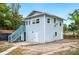 This two-story home includes a rear staircase and private entry at 717 Frank Lloyd Wright Way, Lakeland, FL 33803