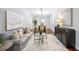 Comfortable living room with a gray sofa and stylish decor at 717 Frank Lloyd Wright Way, Lakeland, FL 33803
