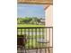 Balcony with a stunning view, creating a peaceful spot to unwind and appreciate the surrounding landscape at 733 Carpenters Way # 36, Lakeland, FL 33809