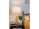 Bedroom with side table featuring a lamp, plant and tissue box for added comfort at 733 Carpenters Way # 36, Lakeland, FL 33809