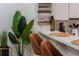 Stylish breakfast bar area featuring modern decor, comfortable seating, and elegant accents creating a cozy and functional space at 733 Carpenters Way # 36, Lakeland, FL 33809