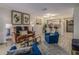 Inviting living room with stylish decor, modern lighting, and an open view to the kitchen at 733 Carpenters Way # 36, Lakeland, FL 33809