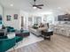 Bright and spacious living room with modern furnishings, hardwood floors, and an open floor plan at 7562 Sw 108Th St, Ocala, FL 24476