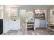 Functional bathroom featuring a vanity, toilet, shower, and laundry area at 7721 Forest Way, Lakeland, FL 33810