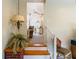 Entryway featuring stairs leading to a living room and a glimpse of cozy home interior at 7721 Forest Way, Lakeland, FL 33810