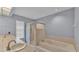 Bathroom showcasing a soaking tub, a walk-in shower, dual sinks, and natural light at 7741 Merrily Way, Lakeland, FL 33809
