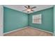 Bedroom with a ceiling fan and neutral tones at 7741 Merrily Way, Lakeland, FL 33809