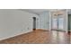 Bright entryway with tile floors, decorative front doors and adjacent office at 7741 Merrily Way, Lakeland, FL 33809