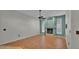 Spacious living room featuring a fireplace, tile flooring, and natural light at 7741 Merrily Way, Lakeland, FL 33809