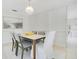 Well-lit dining room boasts modern furnishings and décor, offering a cozy ambiance for enjoying meals at 865 E Mann Rd, Bartow, FL 33830