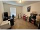 Bright bedroom with large window, desk, and ample storage space, perfect for studying at 879 Grandin St, Davenport, FL 33837