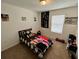 Cozy bedroom featuring themed bedding, natural light, and wall decorations at 879 Grandin St, Davenport, FL 33837