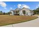 Charming single Gathering home with well manicured lawn and mature landscaping at 8909 N Campbell Rd, Lakeland, FL 33810