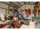 Storage shed featuring a variety of yard tools and equipment at 8909 N Campbell Rd, Lakeland, FL 33810