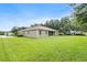 Wide backyard with well maintained lawn space at 1001 Lena Run Ct, Winter Haven, FL 33880