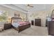 Large bedroom with decorative wall art, a full bedroom set, and recessed lighting at 1001 Lena Run Ct, Winter Haven, FL 33880