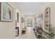 Bright hallway featuring modern tile and art decorations at 1001 Lena Run Ct, Winter Haven, FL 33880