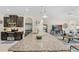Spacious kitchen boasts granite countertops and stainless steel appliances at 1001 Lena Run Ct, Winter Haven, FL 33880