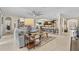 Open living space with view of kitchen and breakfast bar at 1001 Lena Run Ct, Winter Haven, FL 33880