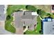 Drone shot of a lovely home showcasing its roof, well manicured lawns, and landscaped yard at 1056 Rally Dr, Polk City, FL 33868
