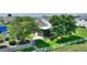 This home features a spacious backyard with a peaceful screened patio, perfect for outdoor relaxation at 1056 Rally Dr, Polk City, FL 33868