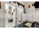 Features a wash basin with a full bathroom in the adjacent room, providing convenience and functionality at 1056 Rally Dr, Polk City, FL 33868