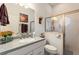 Well-lit bathroom features modern fixtures, a glass-enclosed shower, and a sleek vanity with storage at 1056 Rally Dr, Polk City, FL 33868