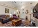 Bright and airy living room featuring stylish furniture, vaulted ceilings, and elegant decor at 1056 Rally Dr, Polk City, FL 33868