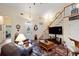 Comfortable living space with a staircase, stylish decor, and ample natural light, perfect for relaxation at 1056 Rally Dr, Polk City, FL 33868