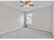 Bedroom with bright natural light from the window at 1106 Tropea Ln, Auburndale, FL 33823