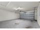 Spacious two-car garage with ample room for parking and storage solutions at 1106 Tropea Ln, Auburndale, FL 33823