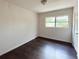 Bedroom with hard wood floors, neutral walls, and natural light at 1160 Austin St, Bartow, FL 33830