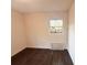 Bright bedroom with hardwood floors and one window at 1160 Austin St, Bartow, FL 33830