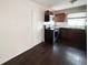 Kitchen with wood cabinets, black appliances, and tile backsplash at 1160 Austin St, Bartow, FL 33830
