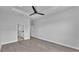 Open bedroom with ceiling fan and ensuite bath at 1171 Windjammer Dr, Lakeland, FL 33803
