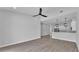 Open floor plan living room flowing into modern kitchen at 1171 Windjammer Dr, Lakeland, FL 33803