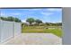 Paver patio with serene pond views, perfect for outdoor relaxation and entertaining at 1171 Windjammer Dr, Lakeland, FL 33803